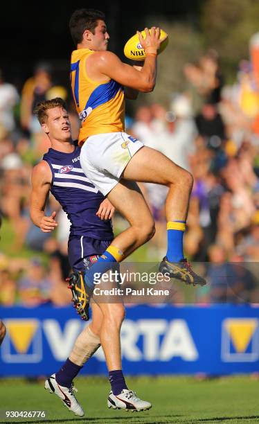 Tom Barrass of the Eagles marks the ball during the JLT Community Series AFL match between the Fremantle Dockers and the West Coast Eagles at HBF...