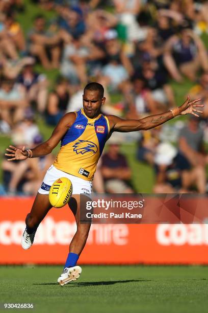 Lewis Jetta of the Eagles passes the ball during the JLT Community Series AFL match between the Fremantle Dockers and the West Coast Eagles at HBF...