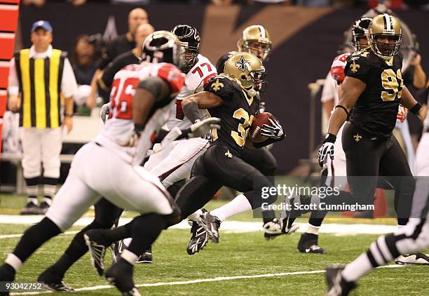 Jabari Greer of the New Orleans Saints returns an interception against the Atlanta Falcons at the Louisiana Superdome on November 2, 2009 in New...