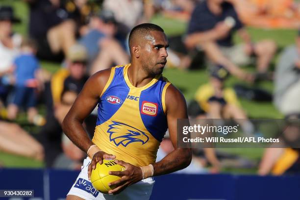 Lewis Jetta of the Eagles looks to pass the ball during the JLT Community Series AFL match between the Fremantle Dockers and the West Coast Eagles at...