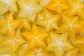 Star fruit, starfruit or star apple , Averrhoa carambola slice background