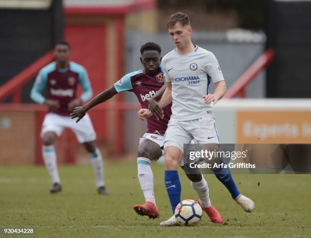 Charlie Colkett of Chelsea in action with Domingos Quina of West Ham United during the Premier League 2 match between West Ham United and Chelsea FC...