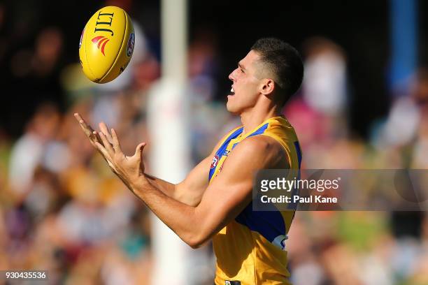 Jake Waterman of the Eagles marks the ball during the JLT Community Series AFL match between the Fremantle Dockers and the West Coast Eagles at HBF...
