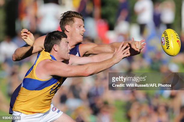 Jeremy McGovern of the Eagles and Matt Taberner of the Dockers in action during the JLT Community Series AFL match between the Fremantle Dockers and...