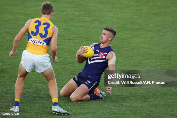 Luke Ryan of the Dockers marks the ball during the JLT Community Series AFL match between the Fremantle Dockers and the West Coast Eagles at HBF...