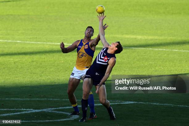 Scott Lycett of the Eagles contests a ruck with Lloyd Meek of the Dockers during the JLT Community Series AFL match between the Fremantle Dockers and...