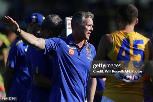 Adam Simpson, Senior Coach of the Eagles, addresses the players at the quarter time break during the JLT Community Series AFL match between the...