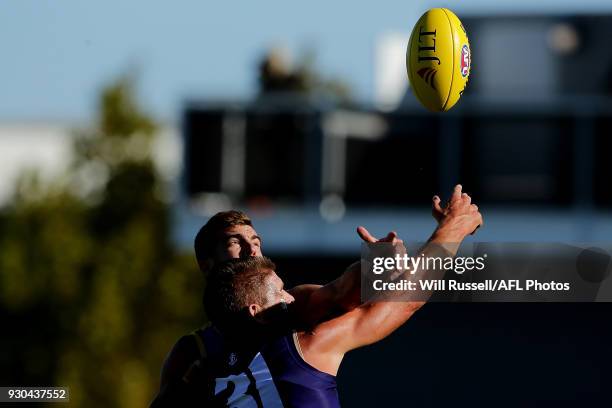 Scott Lycett of the Eagles contests a ruck with Aaron Sandilands of the Dockers during the JLT Community Series AFL match between the Fremantle...