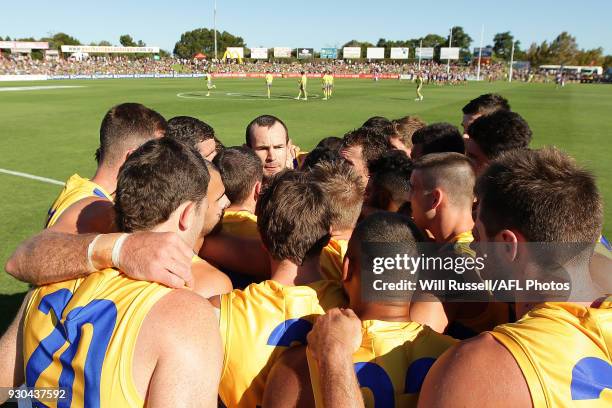 Shannon Hurn of the Eagles speaks to the huddle at the start of the game during the JLT Community Series AFL match between the Fremantle Dockers and...