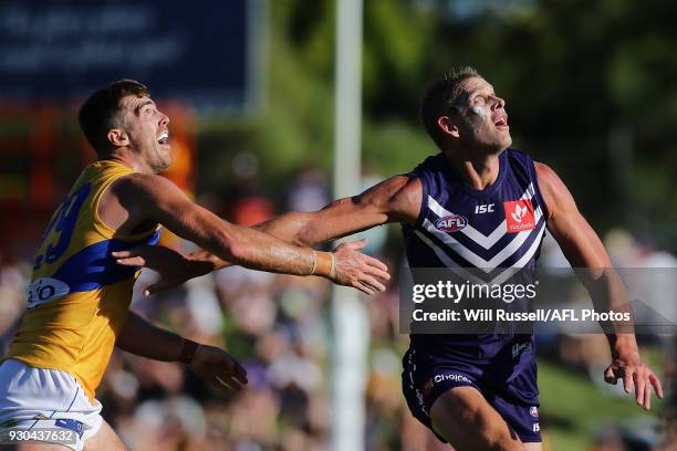 Scott Lycett of the Eagles contests a ruck with Aaron Sandilands of the Dockers during the JLT Community Series AFL match between the Fremantle...