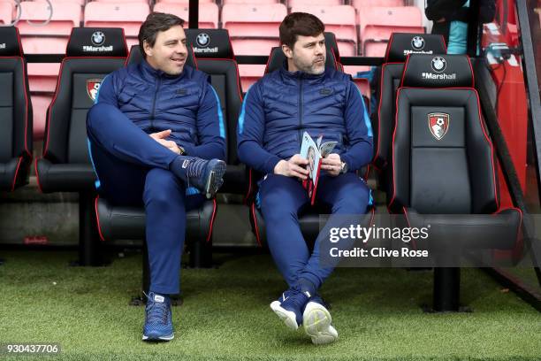 Miguel D'Agostino, Tottenham Hotspur coach and Mauricio Pochettino, Manager of Tottenham Hotspur speak on the bench prior to the Premier League match...