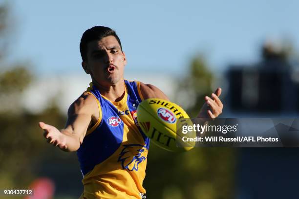 Tom Cole of the Eagles marks the ball during the JLT Community Series AFL match between the Fremantle Dockers and the West Coast Eagles at HBF Arena...