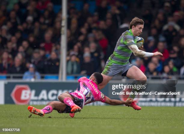 Newcastle Falcons' Simon Hammersley evades the tackle of Exeter Cheifs' Tom O'Flaherty during the Anglo Welsh Cup Semi Final match between Exeter...