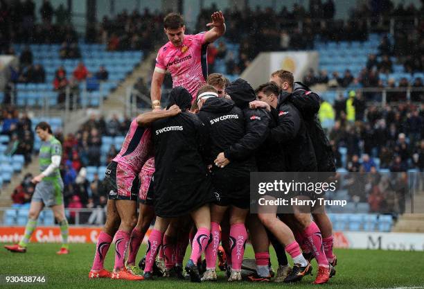 The Exeter Chiefs players celebrate as Joe SImmonds of Exeter Chiefs scores his sides second try during the Anglo-Welsh Cup Semi Final match between...