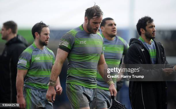 Members of the Newcastle Falcons side cut dejected figures at the final whistle during the Anglo-Welsh Cup Semi Final match between Exeter Chiefs and...