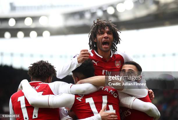 Pierre-Emerick Aubameyang of Arsenal celebrates scoring the 2nd Arsenal goal with Mohamed Elneny of Arsenal during the Premier League match between...