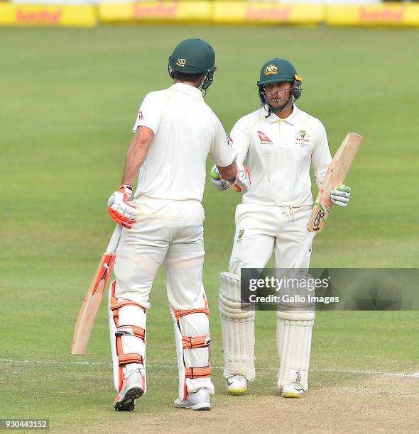 Usman Khawaja of Australia celebrates scoring a half century during day 3 of the 2nd Sunfoil Test match between South Africa and Australia at St...