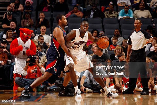 Nazr Mohammed of the Charlotte Bobcats posts up against Jason Collins of the Atlanta Hawks during the game on November 6, 2009 at Time Warner Cable...