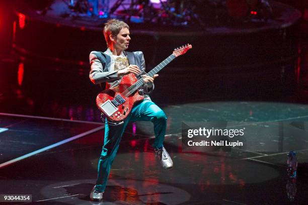 Matt Bellamy of Muse performs on stage at the O2 Arena on November 13, 2009 in London, England.