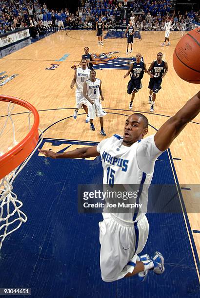 Elliot Williams of the Memphis Tigers goes up for a dunk against the Jackson State Tigers on November 13, 2009 at FedexForum in Memphis, Tennessee.