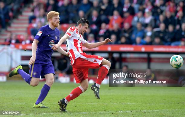 Fabian Kalig of Erzgebirge Aue and Steven Skrzybski of 1 FC Union Berlin during the 2nd Bundesliga game between Union Berlin and FC Erzgebirge Aue at...