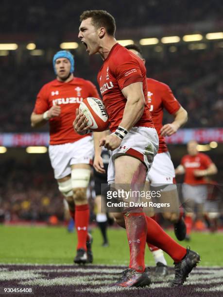George North of Wales celebrates as he scores their second try during the NatWest Six Nations match between Wales and Italy at Principality Stadium...