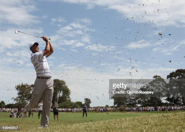 Tiger Woods of the USA plays an approach shot on the 7th hole during round three of the 2009 Australian Masters at Kingston Heath Golf Club on...