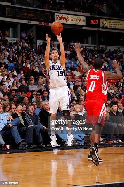 Beno Udrih of the Sacramento Kings shoots the ball over Aaron Brooks of the Houston Rockets on November 13, 2009 at ARCO Arena in Sacramento,...