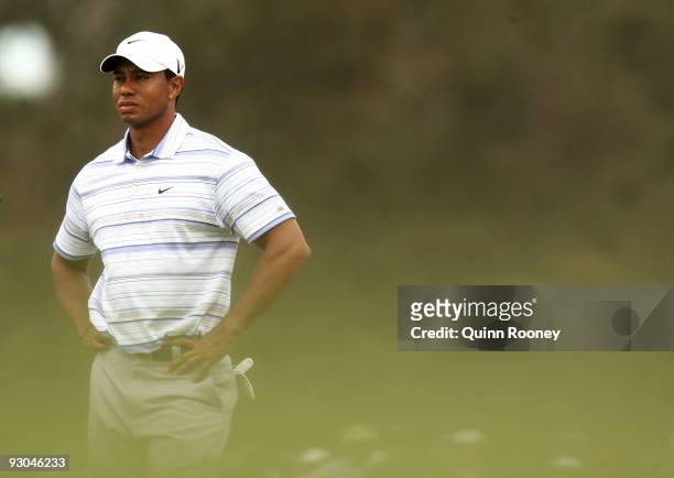 Tiger Woods of the USA prepares to play an approach shot on the 3rd hole during round three of the 2009 Australian Masters at Kingston Heath Golf...
