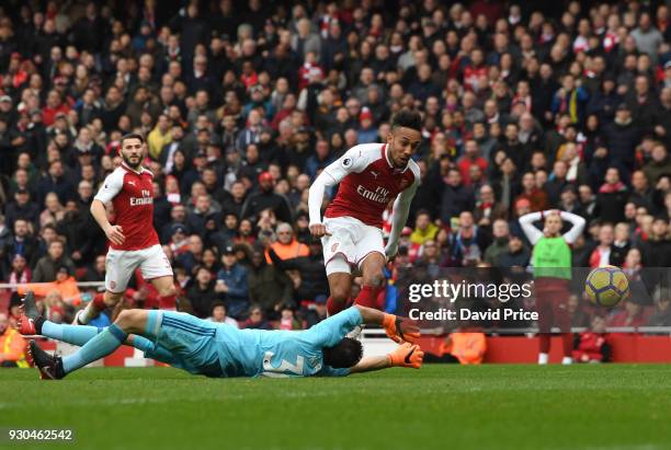 Pierre-Emerick Aubameyang scores Arsenal's 2nd goal past Orestis Karnezis of Watford during the Premier League match between Arsenal and Watford at...