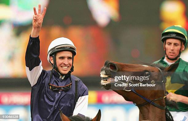 Michael Rodd gestures after riding Zipping to win race 7 the TMB Printing Sandown Classic on Sandown Classic Day at Sandown Lakeside on November 14,...