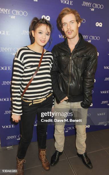 Sophie Wu and Luke Treadaway attend the launch of Jimmy Choo's exclusive collection for H&M on November 13, 2009 in London, England.