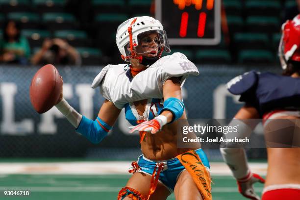 Tina Caccavale of the Miami Caliente throws the ball against the New York Majesty on November 13, 2009 at the BankAtlantic Center in Sunrise,...