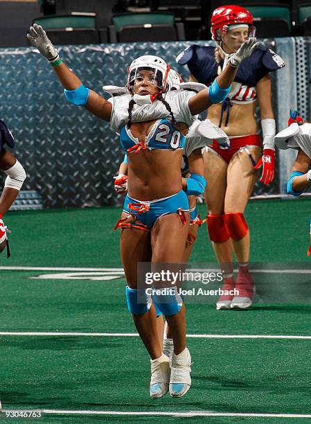 Taira Turley of the Miami Caliente after the team scored against the New York Majesty on November 13, 2009 at the BankAtlantic Center in Sunrise,...