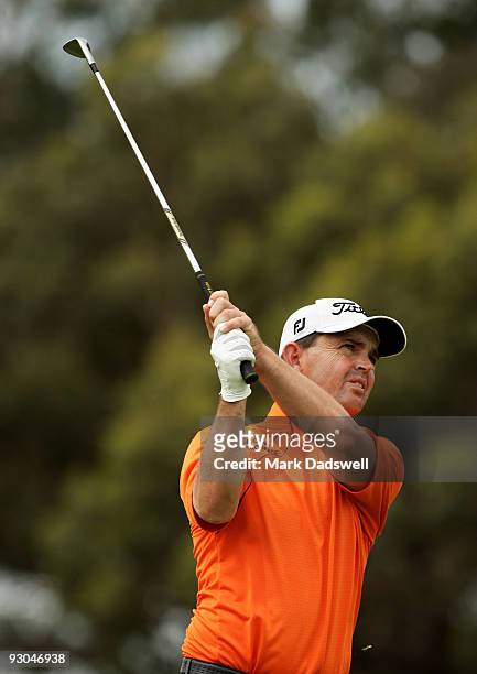 Greg Chalmers of New Zealand plays an approach shot on the 12th hole during round three of the 2009 Australian Masters at Kingston Heath Golf Club on...