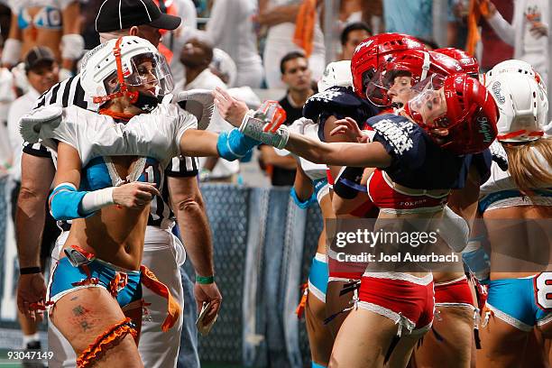 Krystal Gray of the New York Majesty and Tina Caccavale of the Miami Caliente scuffle late in the game on November 13, 2009 at the BankAtlantic...