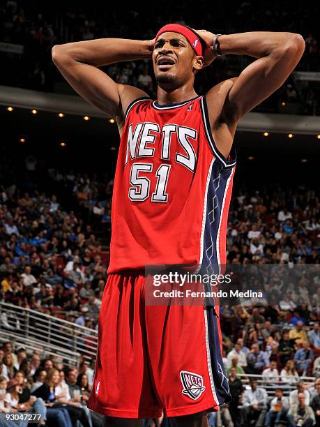 Sean Williams of the New Jersey Nets reacts to a referees call during the game against the Orlando Magic on November 13, 2009 at Amway Arena in...