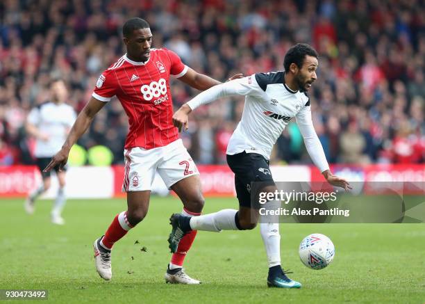 Tendayi Darikwa of Nottingham Forest and Ikechi Anya of Derby County in action during the Sky Bet Championship match between Nottingham Forest and...