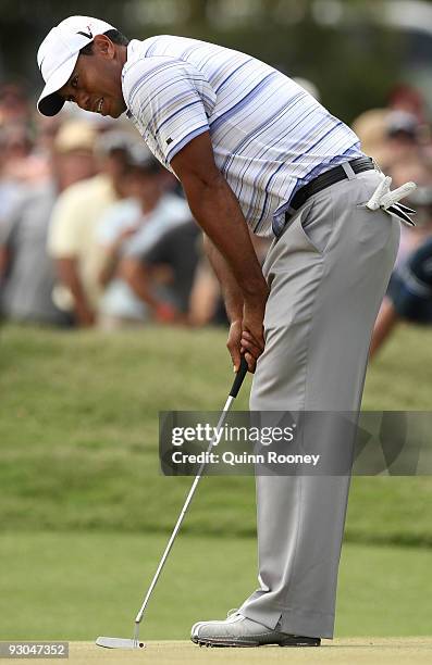 Tiger Woods of the USA putts on the 10th hole during round three of the 2009 Australian Masters at Kingston Heath Golf Club on November 14, 2009 in...