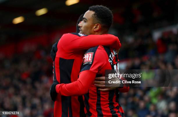 Junior Stanislas of AFC Bournemouth celebrates after scoring his sides first goal with Charlie Daniels of AFC Bournemouth during the Premier League...