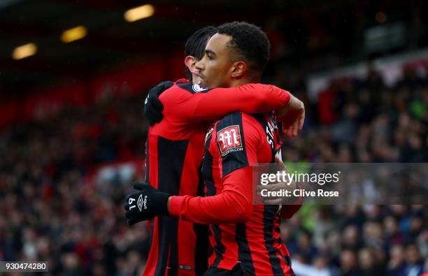 Junior Stanislas of AFC Bournemouth celebrates after scoring his sides first goal with Charlie Daniels of AFC Bournemouth during the Premier League...