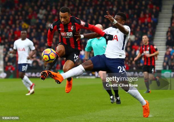 Junior Stanislas of AFC Bournemouth is challenged by Serge Aurier of Tottenham Hotspur during the Premier League match between AFC Bournemouth and...
