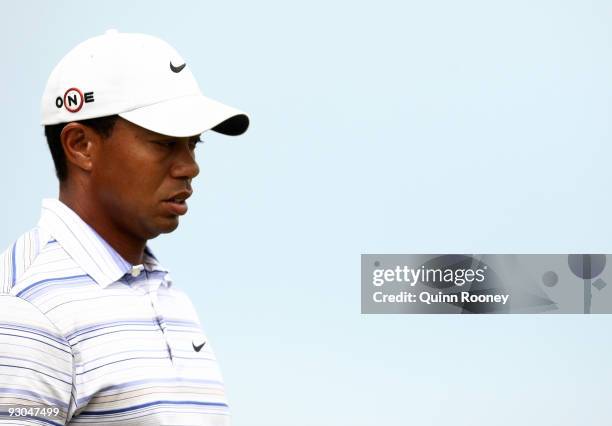 Tiger Woods of the USA prepares to play an approach shot on the 15th hole during round three of the 2009 Australian Masters at Kingston Heath Golf...