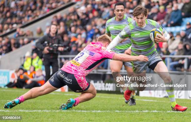 Newcastle Falcons' Simon Hammersley evades the tackle of Exeter Cheifs' Jack Innard during the Anglo Welsh Cup Semi Final match between Exeter Chiefs...