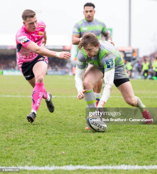 Newcastle Falcons' Simon Hammersley scores his side's second try during the Anglo Welsh Cup Semi Final match between Exeter Chiefs and Newcastle...