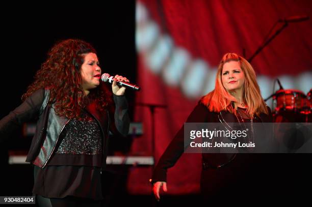 Ann Curless and Jeanette Jurado of Expose perform during the Freestyle concert at Watsco Center on March 10, 2018 in Coral Gables, Florida.
