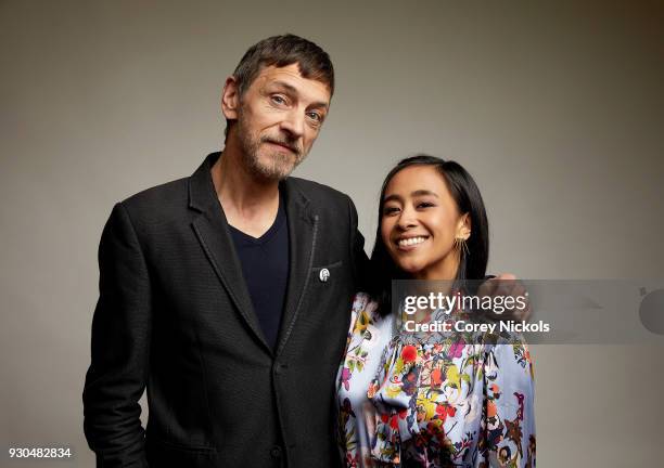 Actors John Hawkes and Charlene de Guzman of the film "Unlovable" pose for a portrait in the Getty Images Portrait Studio Powered by Pizza Hut at the...