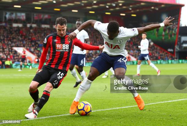 Serge Aurier of Tottenham Hotspur is challenged by Adam Smith of AFC Bournemouth during the Premier League match between AFC Bournemouth and...