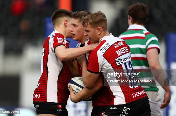 Jack Reeves of Gloucester Rugby U18 celebrates scoring a try with his team mates during the Premiership Rugby U18s Academy Final between Leicester...