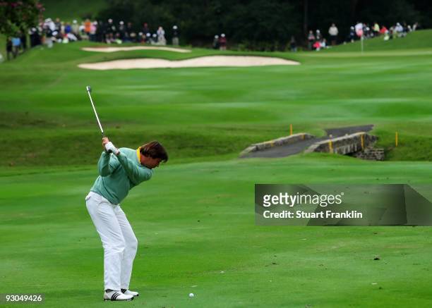 Robert-Jan Derksen of the Netherlands plays his approach shot on the 17th hole during the third round of the UBS Hong Kong Open at the Hong Kong Golf...